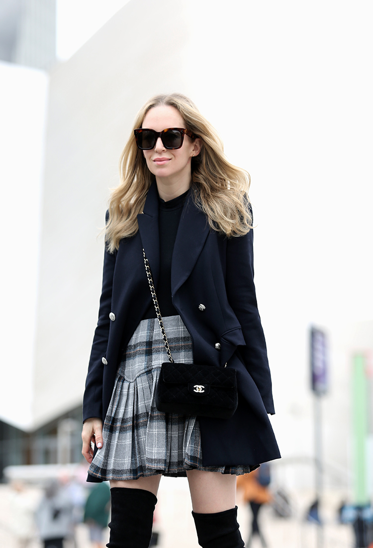 Helena Glazer of Brooklyn Blonde wearing Zara jacket, Only Hearts bodysuit, ASOS skirt, Stuart Weitzman over the knee boots, Celine sunglasses, Chanel bag