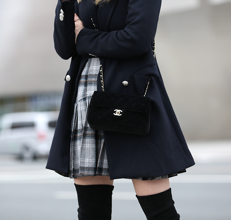 Helena Glazer of Brooklyn Blonde wearing Zara jacket, Only Hearts bodysuit, ASOS skirt, Stuart Weitzman over the knee boots, Celine sunglasses, Chanel bag