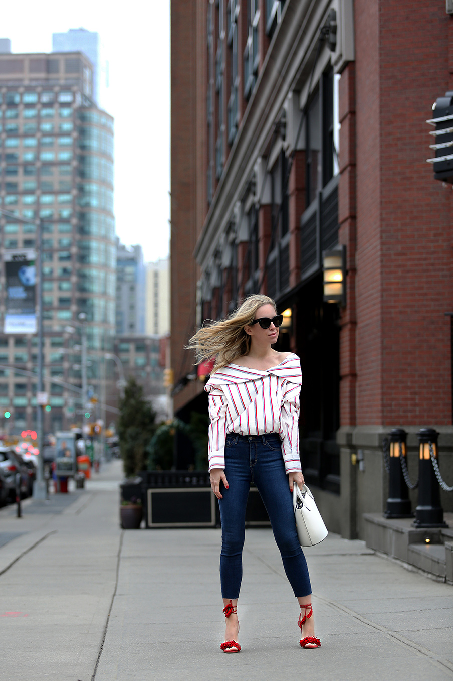 Roxy Hotel NYC Staycation - Helena Glazer of Brooklyn Blonde wearing Storets top with Topshop denim, red Aquazzura Wild Things heels, Celine sunglasses