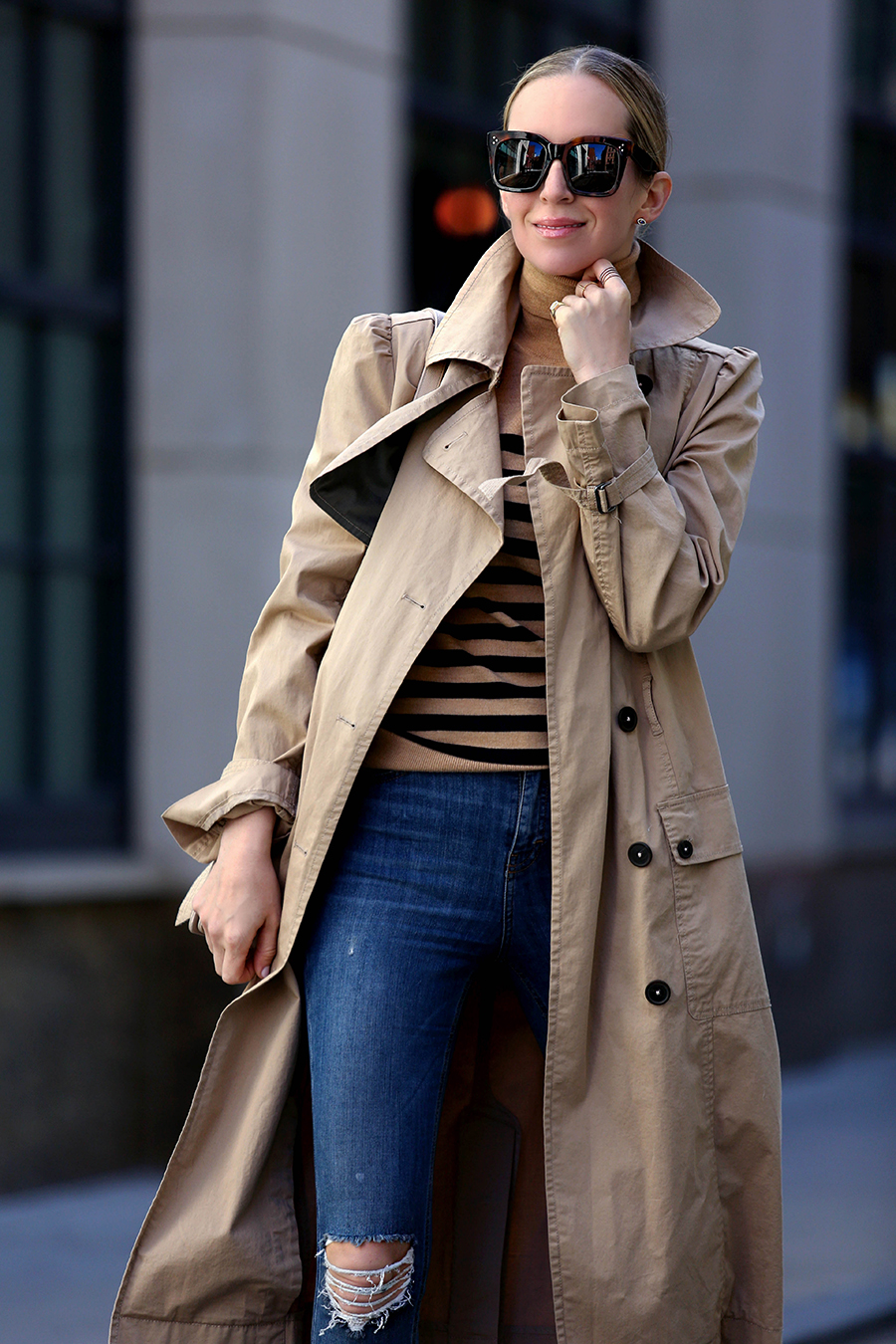 Helena Glazer of Brooklyn Blonde wearing a trench coat by La Vie Rebecca Taylor