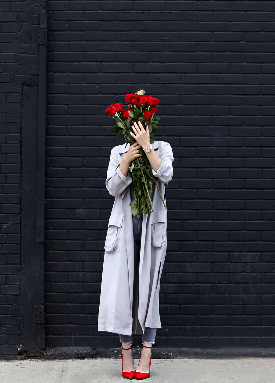 Helena of Brooklyn Blonde wearing a grey monochromatic outfit with Topshop long grey duster jacket, red Aquazzura heels, Senreve bag, MONROW tee, MICHELE watch. Red and grey outfit inspiration