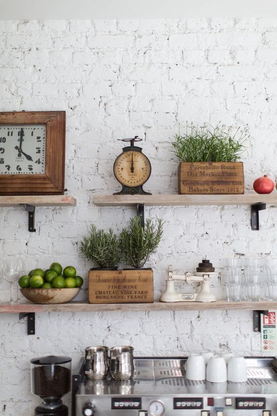 kichen with brick wall and wooden open shelves for Kitchen Inspo