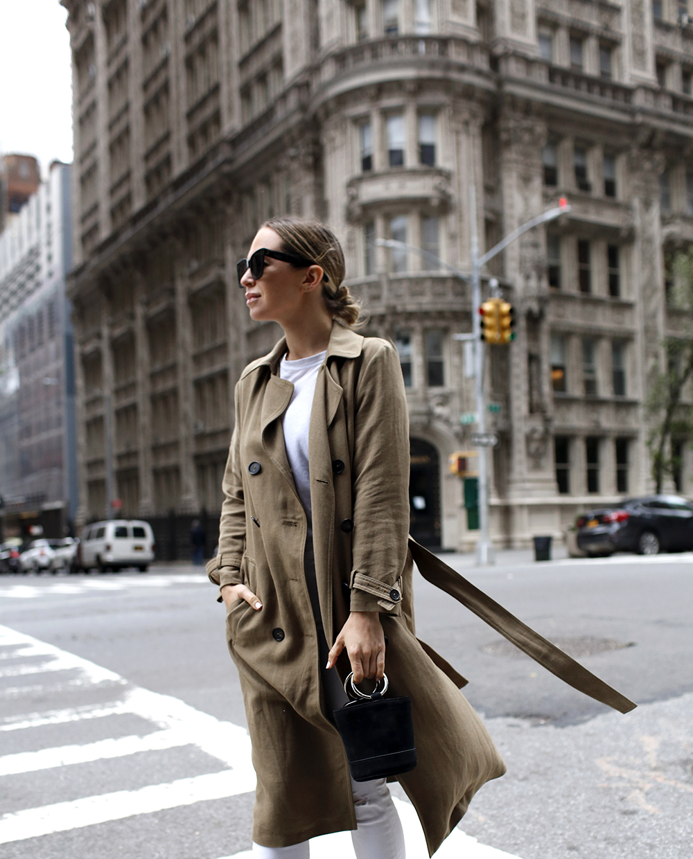 Helena of Brooklyn Blonde wearing Trench Coat and white shirt and pants
