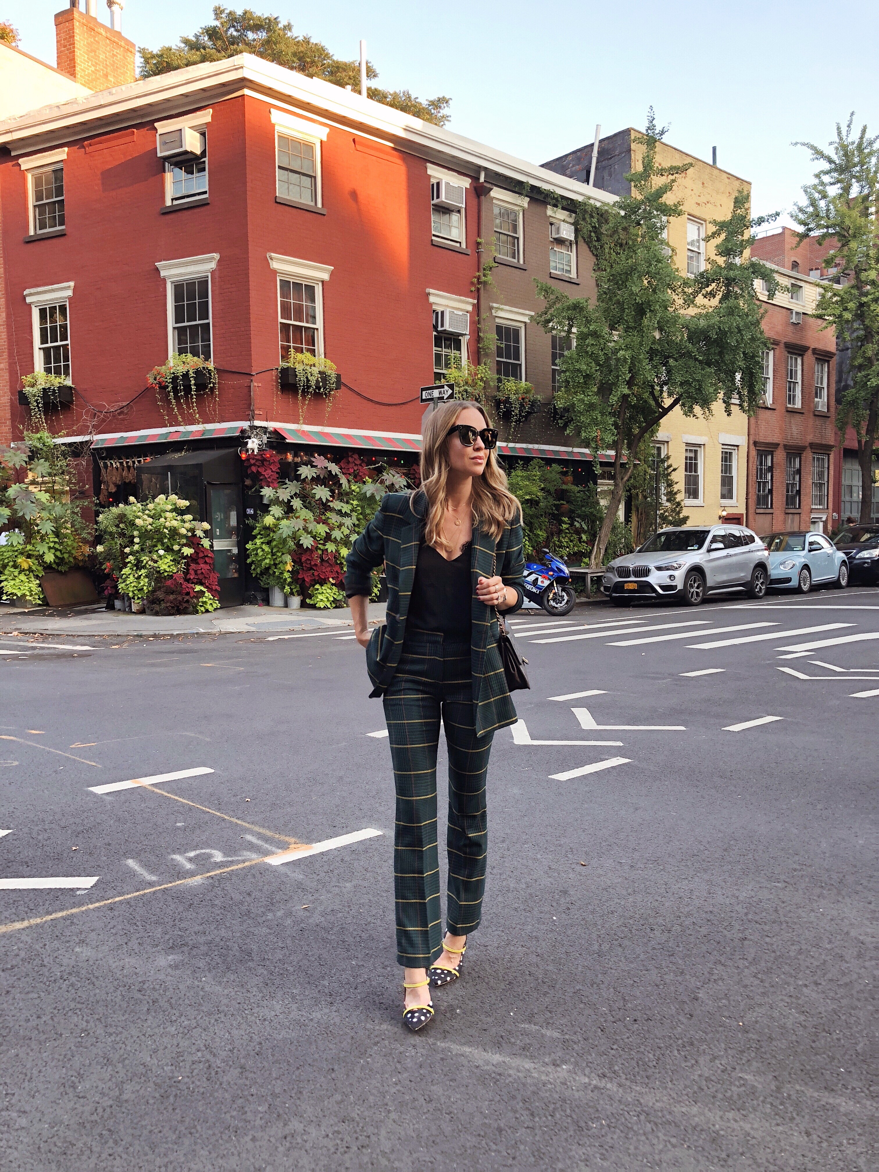 woman wearing plaid suit