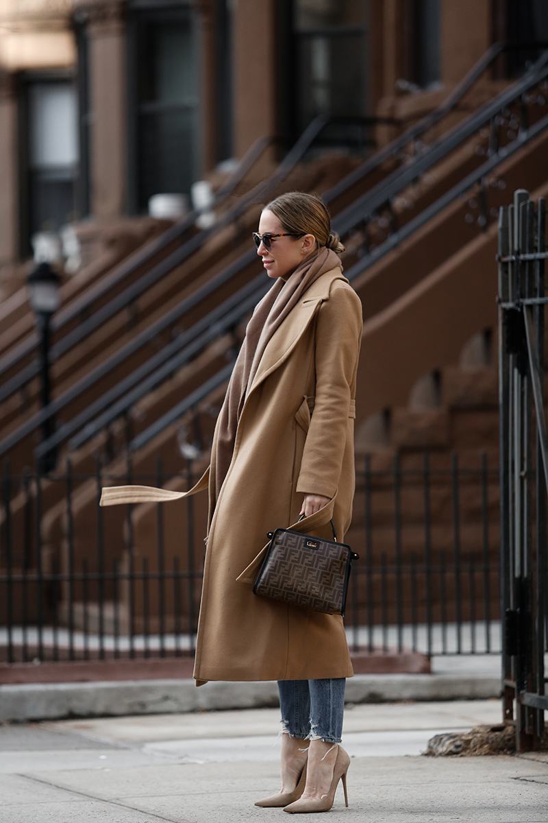 Camel Coat From Sneakers to Heels | Camel Coat Outfit, Fendi Defender Bag, Casual Winter Look, Helena of Brooklyn Blonde