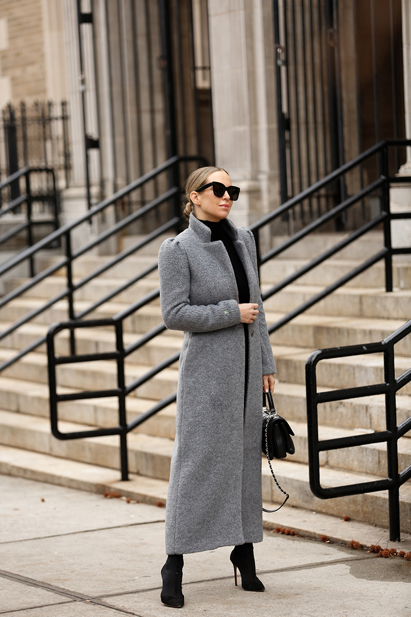 Helena Glazer blogger of Brooklyn Blonde posing for a photo