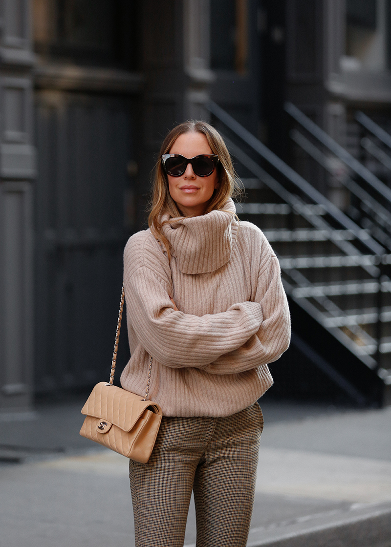 woman wearing sweater, pants, and here Favorite Pairs of Sunglasses