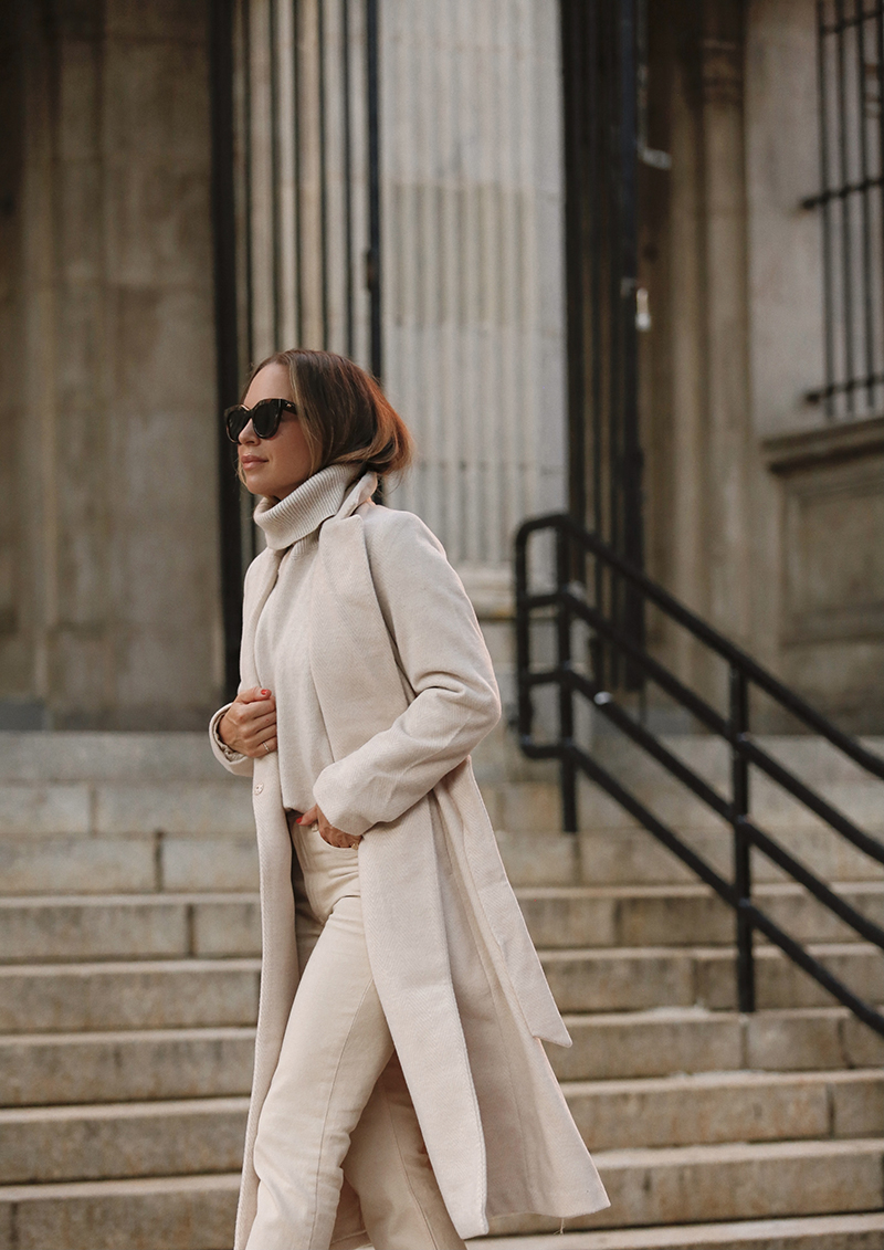 woman wearing all beige outfit for past fall favorites 