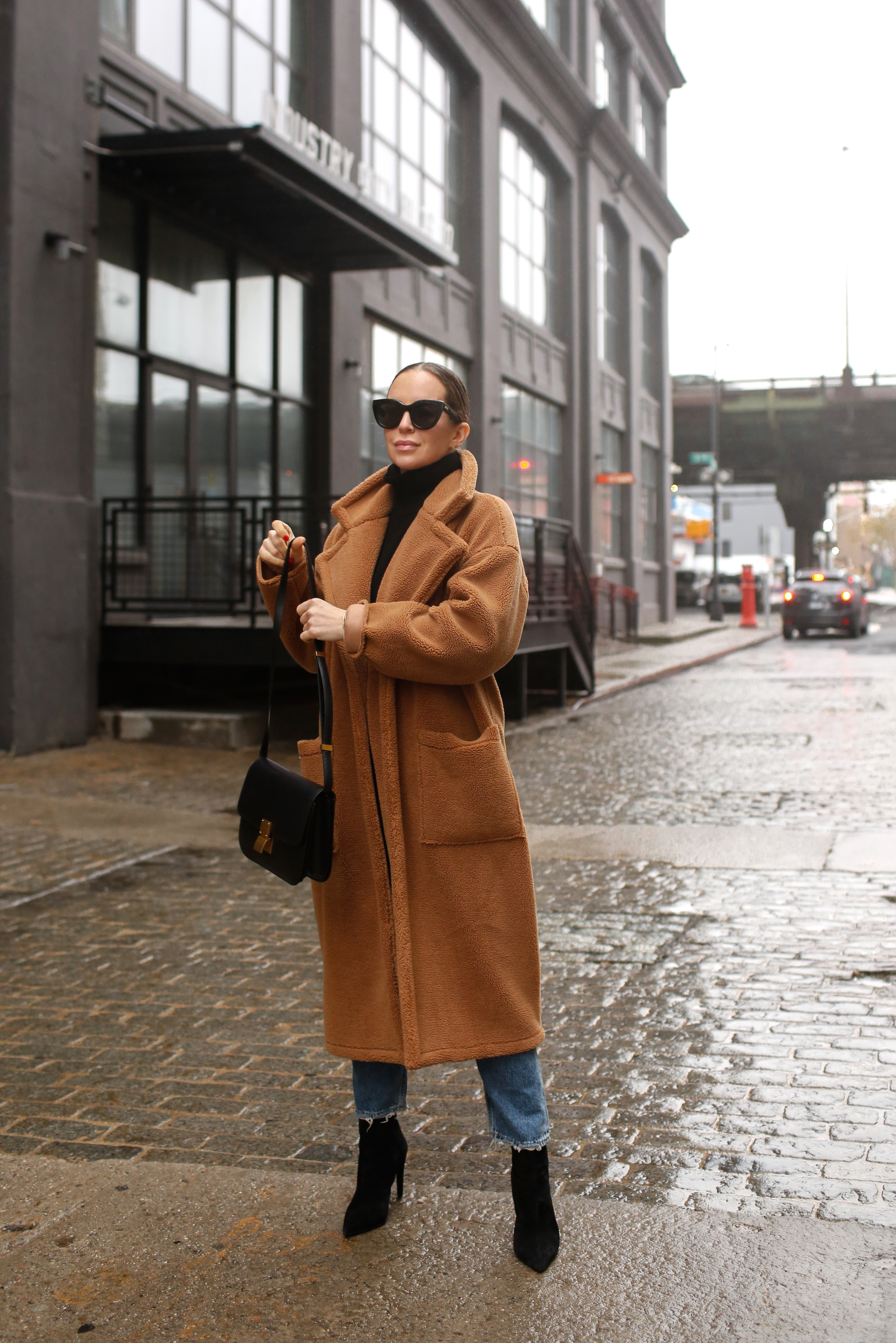 woman wearing trench coat, jeans, boots, and Favorite Pairs of Sunglasses