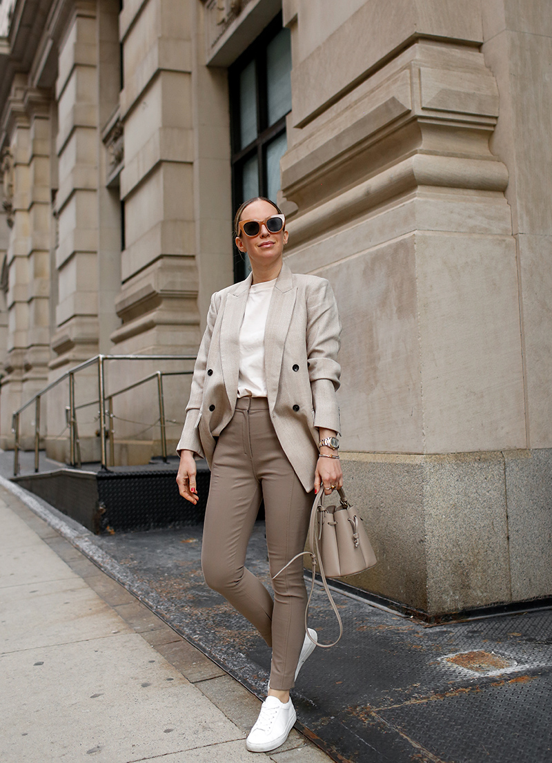 woman in Monochromatic Beige Neutrals, Spring Outfit, M.M. LaFleur O'Hara Blazer, Curie Pant, Leslie T-Shirt, Low-Top Sneakers, Helena of Brooklyn Blonde for High Function High Style