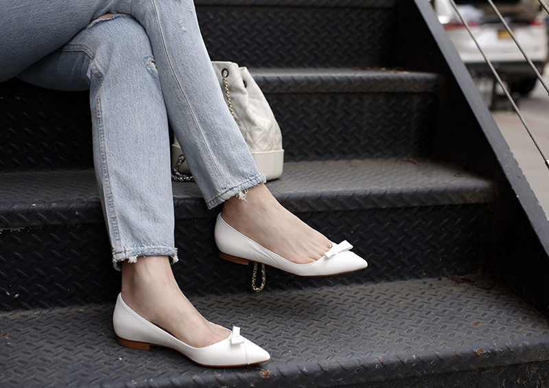 woman wearing denim jeans and Natalie Flat