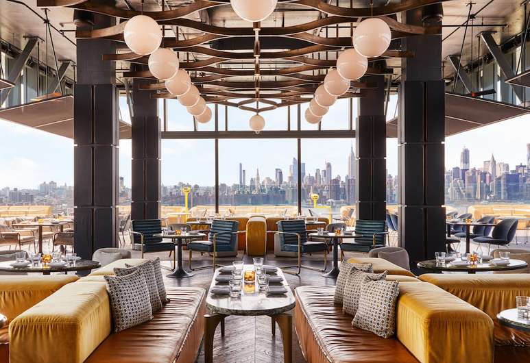 interior of a restaurant with NYC view for Night Out in NYC