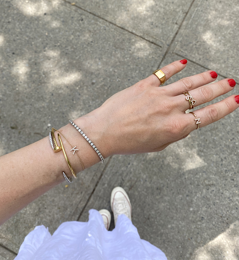 woman's hand showing Jewelry Update with rings and bracelets