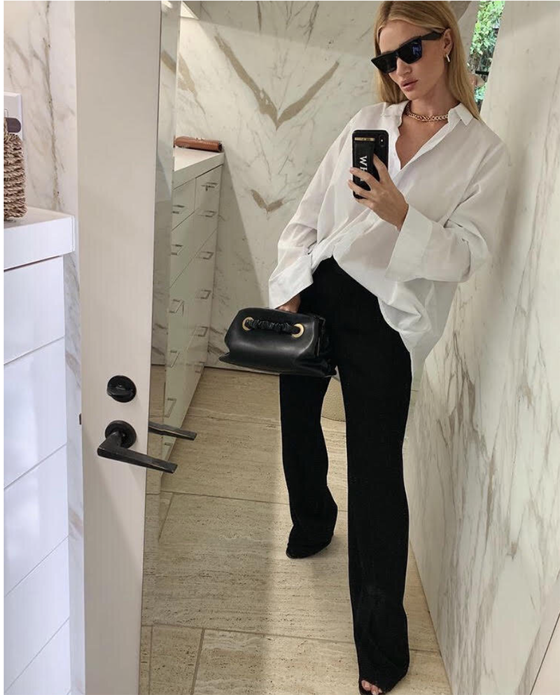 woman wearing white top and black pants for life lately september 2021