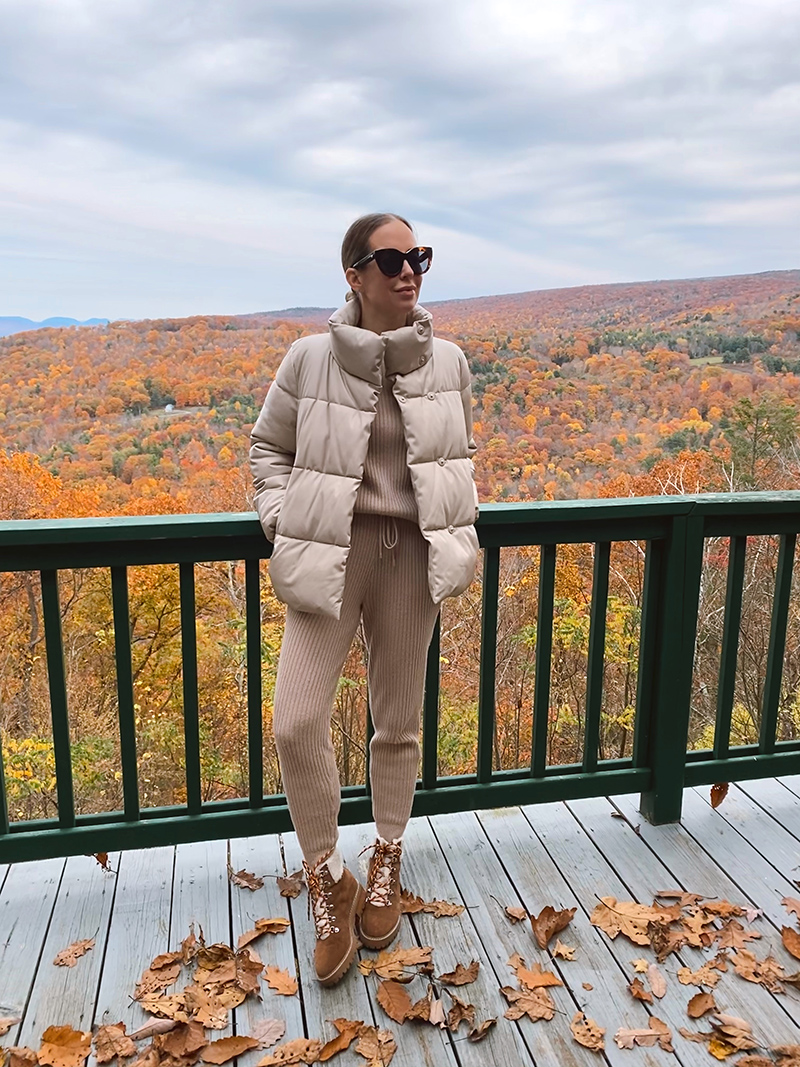 woman wearing jacket, leggings, and boots for Past Fall Favorites