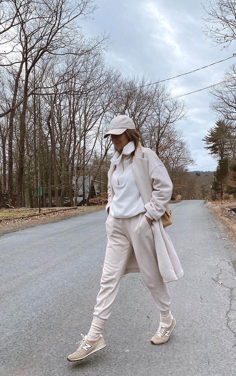 woman wearing all beige outfit 