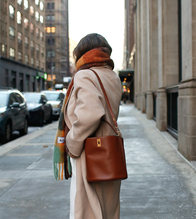 brown bucket bag in focus 