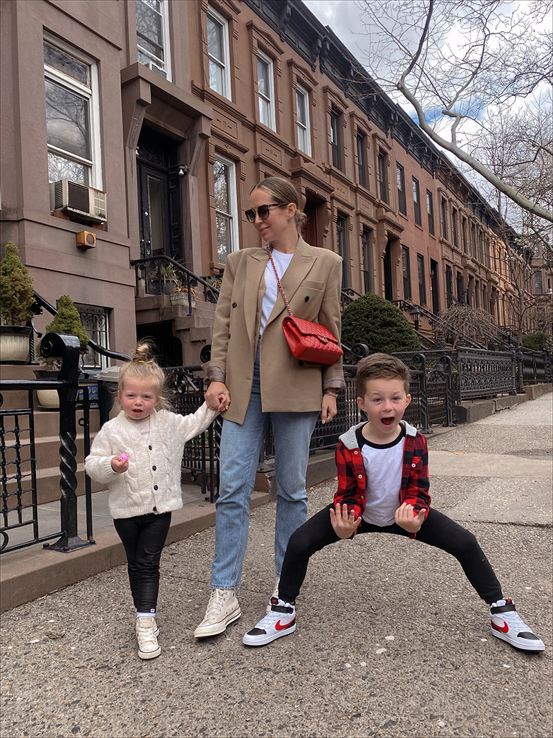 woman wearing one of her Mom-Friendly Outfits with her two kids