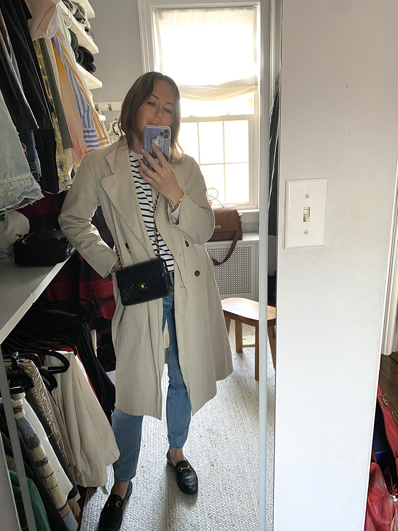 woman taking a selfie wearing a jacket in one of her Mom-Friendly Outfits 