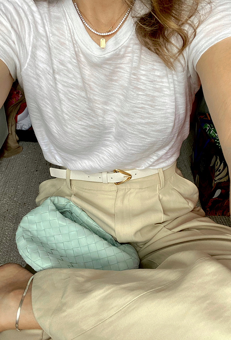 woman wearing white shirt and pants