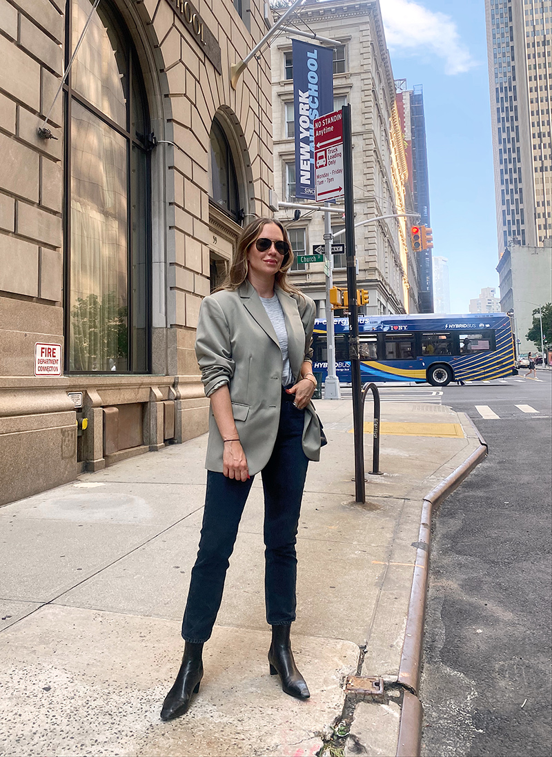 woman wearing Agolde Riley Crop jeans and blazer