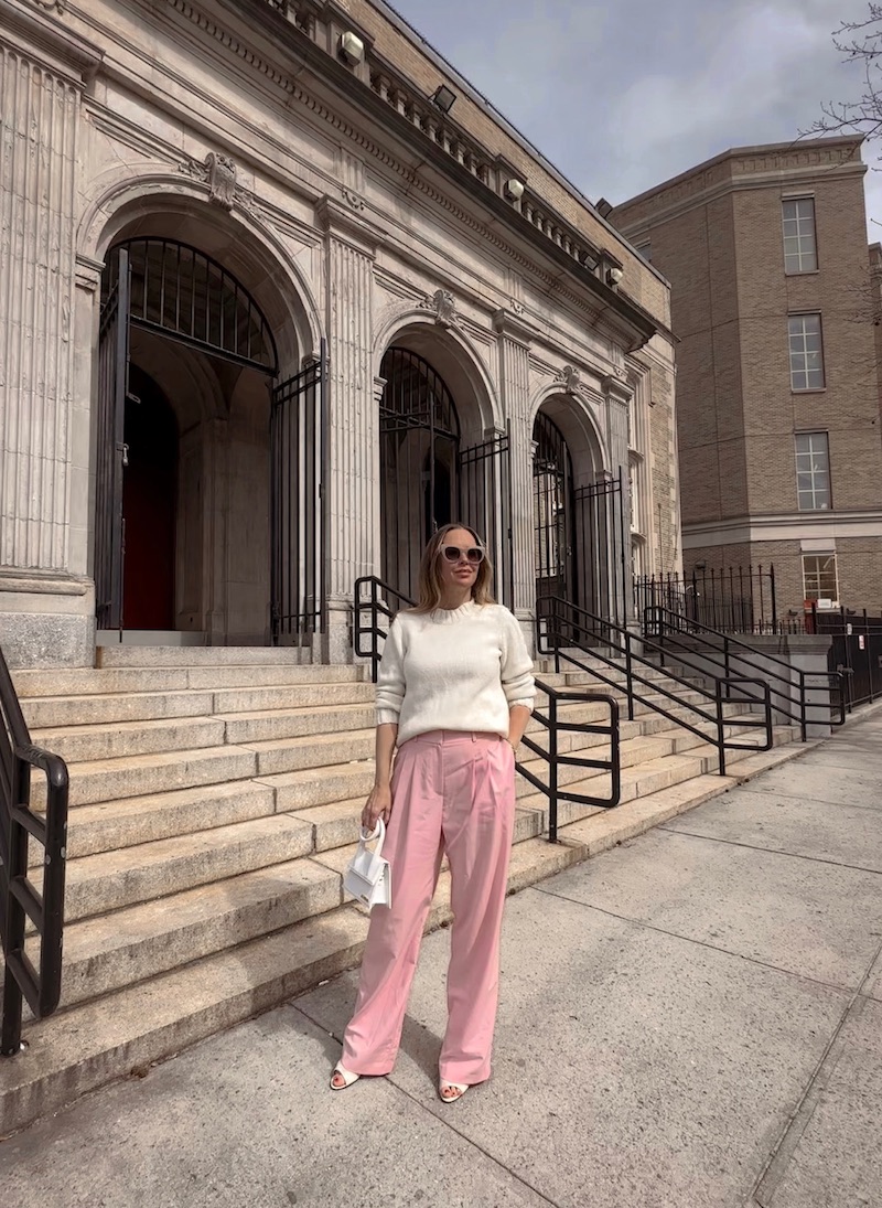 woman wearing white sweater and pink trousers for Week In Outfits