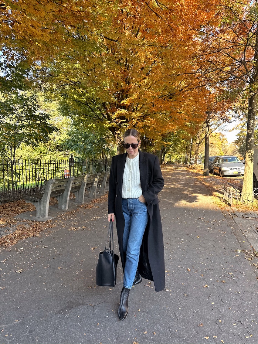 Helena Glazer wearing white top, jeans, and coat for Fall/Winter Outfits